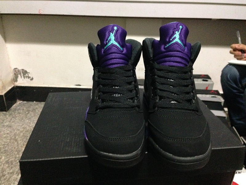 black and purple jordan 5s